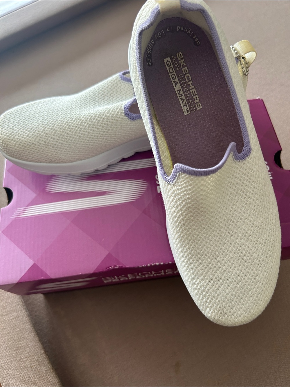 Skechers Women's Slip-On Sneakers in Cream with Lavender Trim